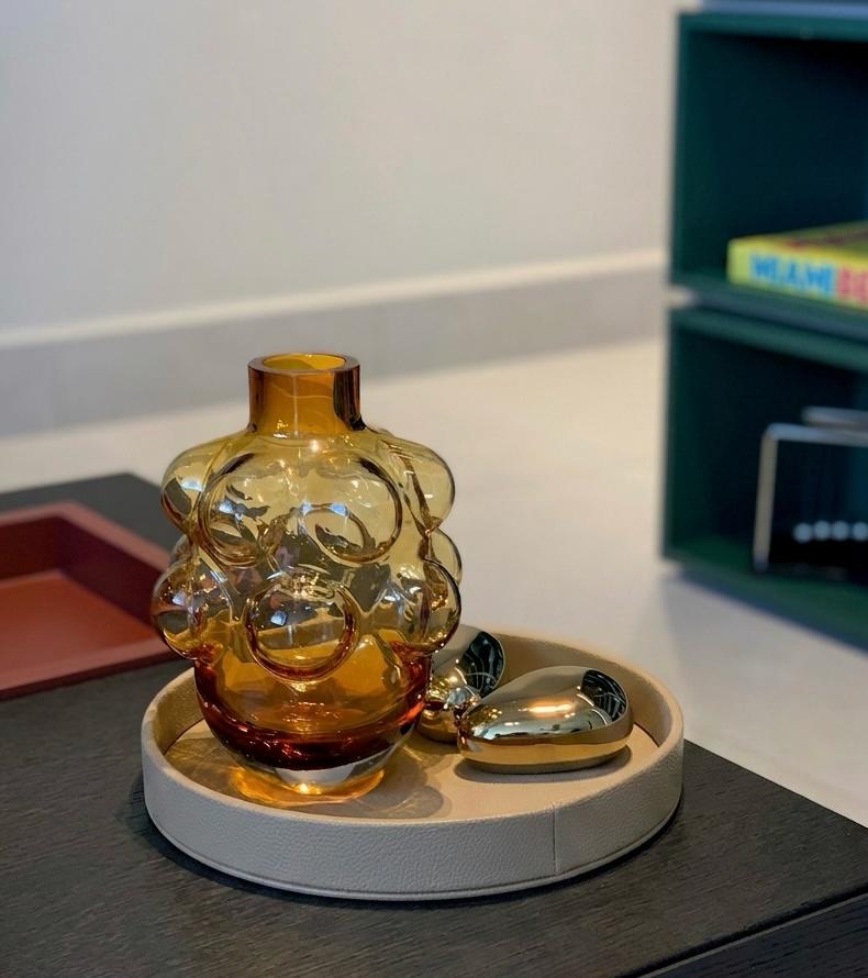 Small round serving tray used to decorate your dinning room 
